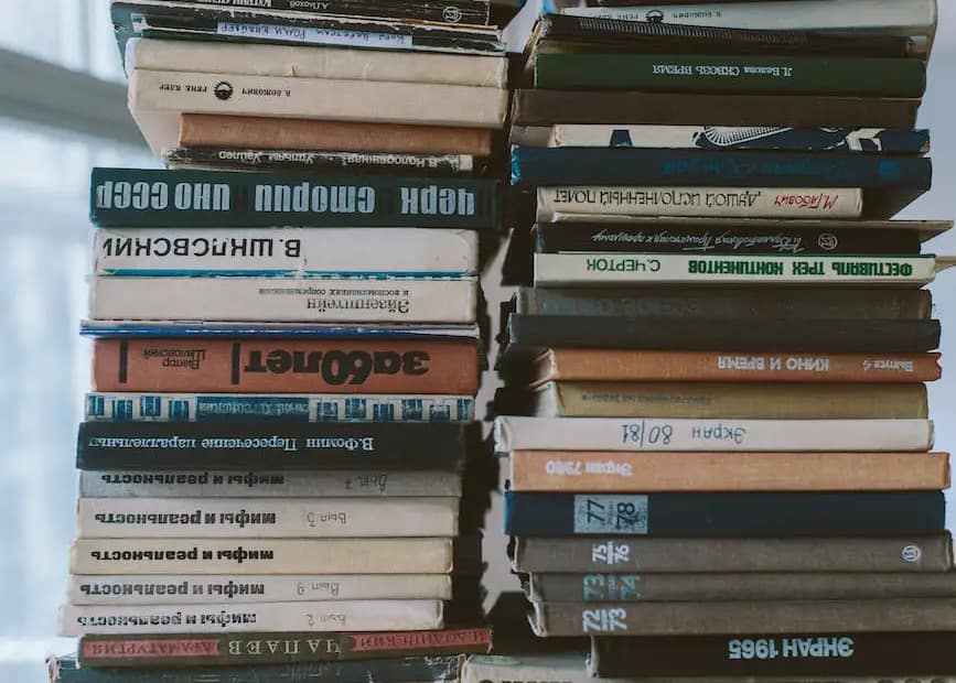 books piled up on the table